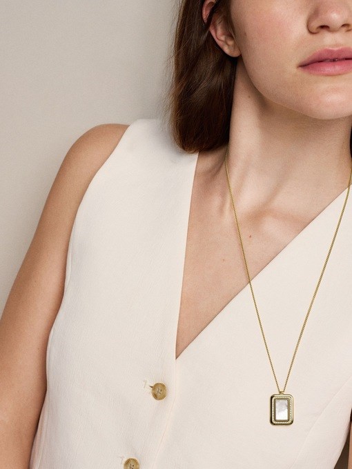 Raquel Glitz White Mother-of-Pearl Spinning Pendant Necklace Raquel Glitz White Mother-of-Pearl Spinning Pendant Necklace